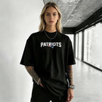Unisex “New England Patriots” T-shirt.