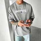 Unisex “New England Patriots” T-shirt.