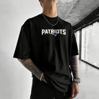 Unisex “New England Patriots” T-shirt.